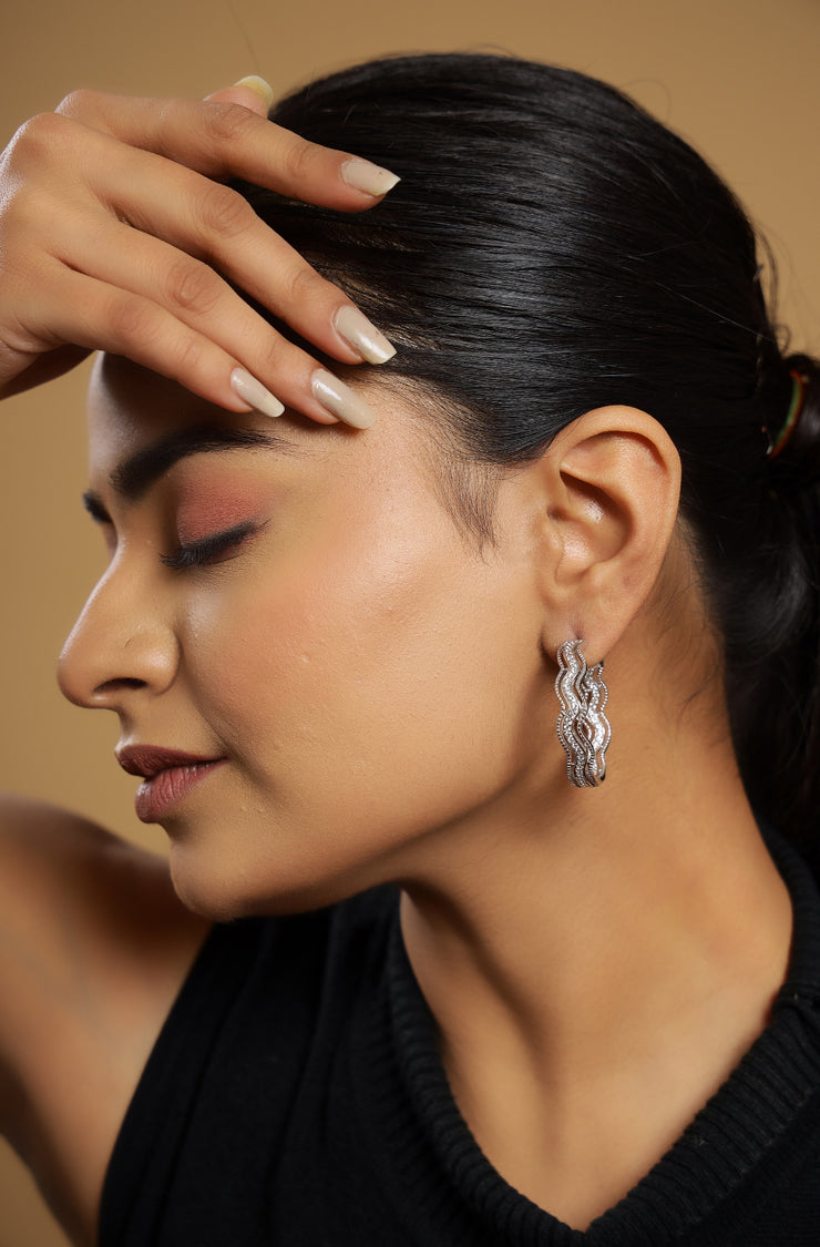 Pure silver with white finish and white sapphire stones earring